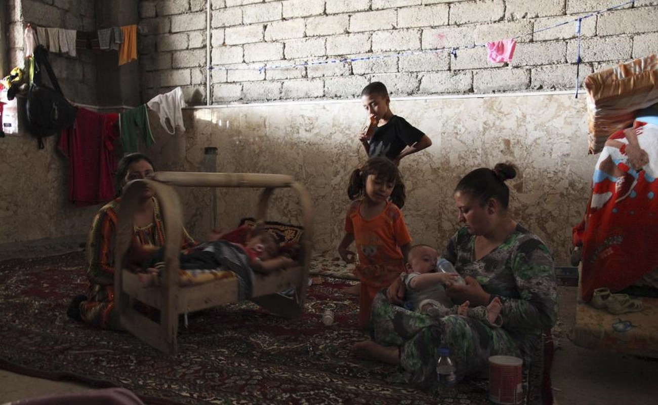 Cong dong nguoi Yazidi: Bi IS truy buc va vung len danh tra-Hinh-18